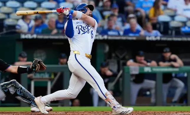 Kansas City Royals' Michael Massey watches his RBI double during the first inning of a baseball game against the Miami Marlins, Wednesday, Sept. 2, 2026, in Kansas City, Mo. (AP Photo/Charlie Riedel)