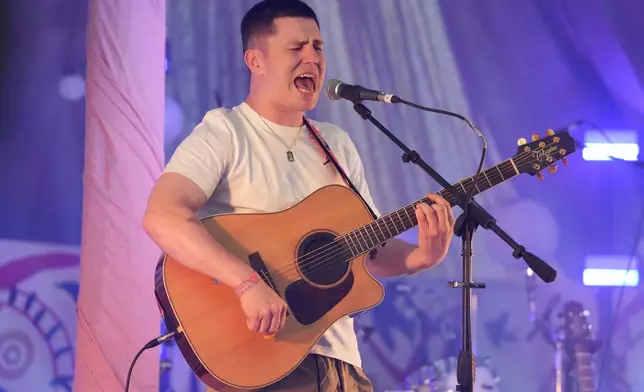 FILE - Aaron Rowe performs during the Glastonbury Festival in Worthy Farm, Somerset, England, on June 26, 2025. (Scott A Garfitt/Invision/AP, File)