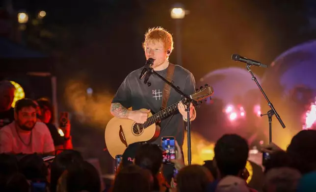 FILE - Singer-songwriter Ed Sheeran performs during "Ed Sheeran's Play: Live from New York" presented by TikTok at Domino Square in the Brooklyn borough of New York, Sept. 13, 2025. (Photo by Andy Kropa/Invision/AP, File)