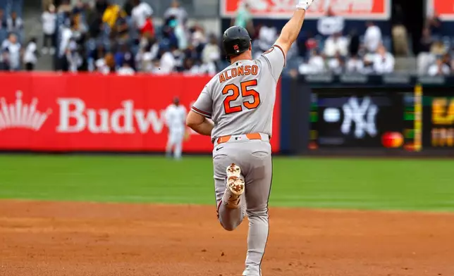 Baltimore Orioles' Pete Alonso runs the bases after hitting a home run against the New York Yankees during the third inning in the first baseball game of a doubleheader, Friday, Sept. 25, 2026, in New York. (AP Photo/Noah K. Murray)