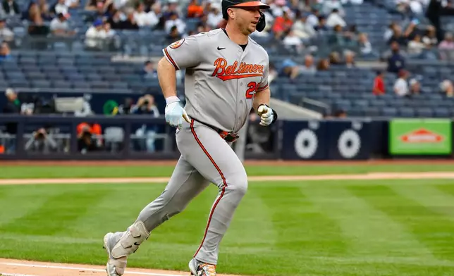 Baltimore Orioles' Pete Alonso runs the bases after hitting a home run against the New York Yankees during the third inning in the first baseball game of a doubleheader, Friday, Sept. 25, 2026, in New York. (AP Photo/Noah K. Murray)
