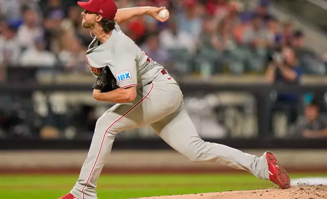 Philadelphia Phillies pitcher Aaron Nola throws during the first inning of a baseball game against the New York Mets, Thursday, Sept. 17, 2026, in New York. (AP Photo/Seth Wenig)