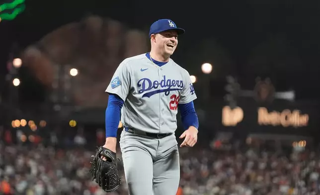 Los Angeles Dodgers pitcher Tarik Skubal (29) smiles as he walks to the dugout after San Francisco Giants' Shay Whitcomb struck out during the fifth inning of a baseball game, Friday, Sept. 25, 2026, in San Francisco. (AP Photo/Jeff Chiu)