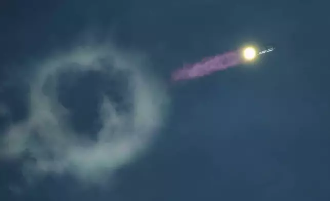 SpaceX's mega rocket Starship makes a test flight from Starbase, Texas, Monday, Sept. 28, 2026. (AP Photo/Eric Gay)