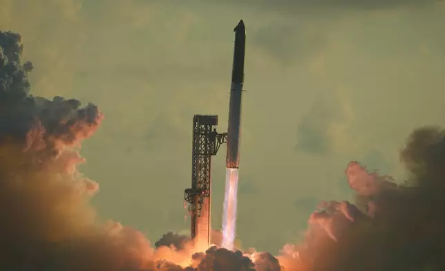 SpaceX's mega rocket Starship makes a test flight from Starbase, Texas, Monday, Sept. 28, 2026. (AP Photo/Eric Gay)
