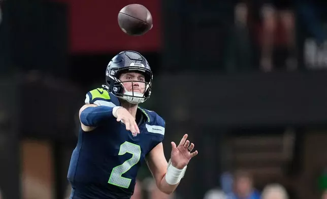 Seattle Seahawks quarterback Drew Lock throws against the Arizona Cardinals during the second half of an NFL football game in Glendale, Ariz., Sunday, Sept. 20, 2026. (AP Photo/Ross D. Franklin)