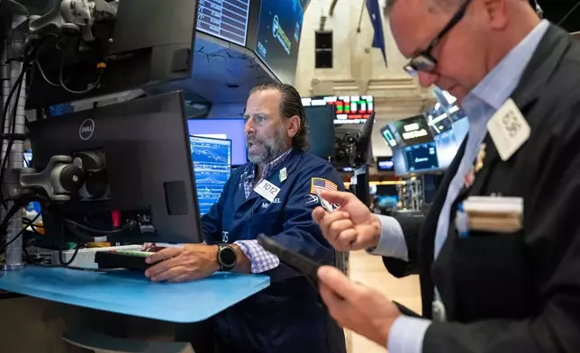 Specialist Michael Pistillo works on the floor of the New York Stock Exchange, Thursday, Aug. 27, 2026, in New York. (AP Photo/Yuki Iwamura)