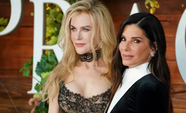 Nicole Kidman, left, and Sandra Bullock arrive at the premiere of "Practical Magic 2" on Monday, Aug. 31, 2026, at the Directors Village in Los Angeles. (Photo by Jordan Strauss/Invision/AP)