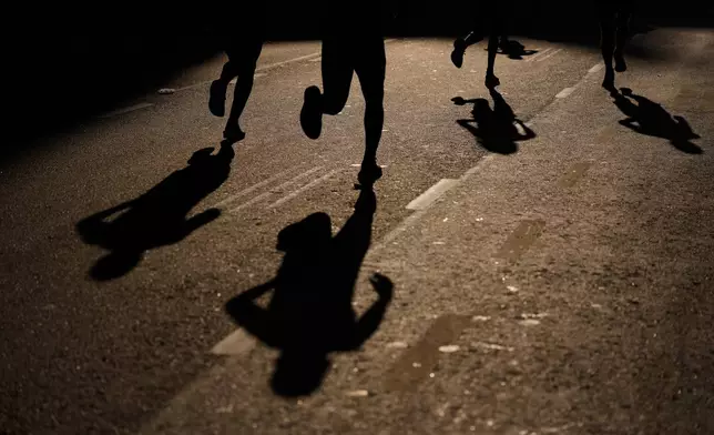 Runners take part in the Buenos Aires Marathon in Argentina, Sunday, Sept. 20, 2026. (AP Photo/Natacha Pisarenko)