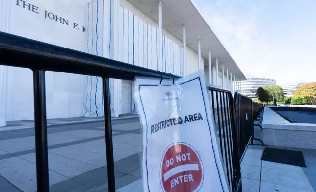 A "Do Not Enter" sign is pictured on the fence at the John F. Kennedy Center for the Performing Arts, Friday, Sept. 25, 2026, in Washington. (AP Photo/Manuel Balce Ceneta)