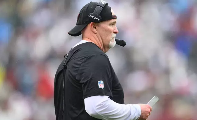 Washington Commanders head coach Dan Quinn during the first half of an NFL football game against the Seattle Seahawks, Sunday, Sept. 27, 2026 in Landover, Md. (AP Photo/Nick Wass)