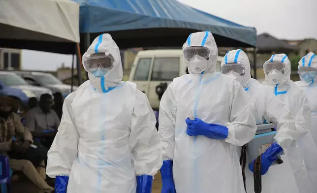 Ebola response teams organize a public demonstration to raise awareness about the Ebola virus disease in Beni, North Kivu province, eastern Congo, Tuesday, Sept. 22, 2026. (AP Photo/Sebastien Kitsa Musayi)