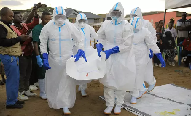 Ebola response teams organize a public demonstration to raise awareness about the Ebola virus disease in Beni, North Kivu province, eastern Congo, Tuesday, Sept. 22, 2026. (AP Photo/Sebastien Kitsa Musayi)