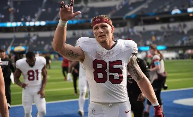 Arizona Cardinals tight end Trey McBride (85) celebrates after an NFL football game against the Los Angeles Chargers, Sunday, Sept. 13, 2026, in Inglewood, Calif. (AP Photo/Gregory Bull)