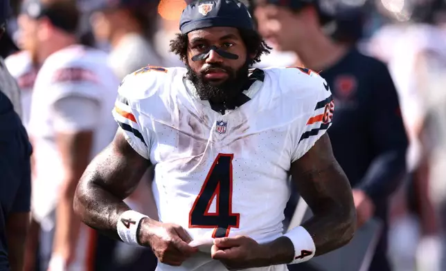 Chicago Bears running back D'Andre Swift (4) looks on after an NFL football game, Sunday, Sept. 13, 2026, in Charlotte, N.C. (AP Photo/Scott Kinser)