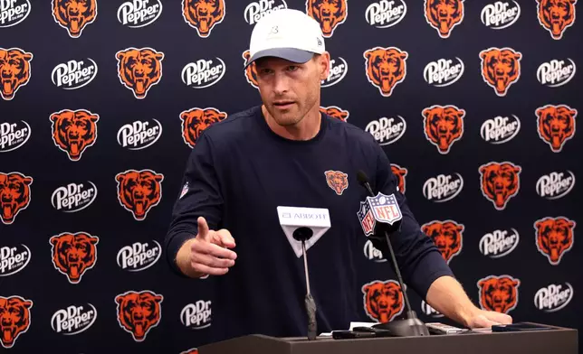 Chicago Bears head coach Ben Johnson speaks in a press conference after an NFL football game, Sunday, Sept. 13, 2026, in Charlotte, N.C. (AP Photo/Scott Kinser)