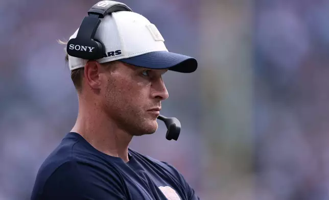 Chicago Bears head coach Ben Johnson looks on during the first half of an NFL football game, Sunday, Sept. 13, 2026, in Charlotte, N.C. (AP Photo/Scott Kinser)