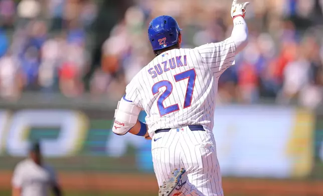 Chicago Cubs' Seiya Suzuki celebrates his home run during the fifth inning of a baseball game against the Miami Marlins, Thursday , Sept. 24, 2026, in Chicago. (AP Photo/Melissa Tamez)