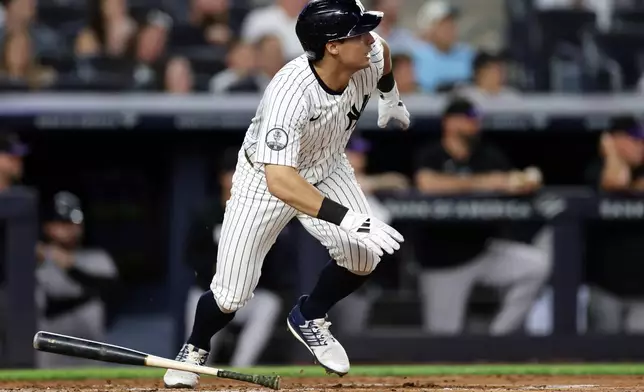 New York Yankees' Anthony Volpe hits a run scoring single during the second inning of a baseball game against the Colorado Rockies, Thursday, Sept. 10, 2026, in New York. (AP Photo/Adam Hunger)