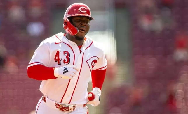 Cincinnati Reds right fielder Hector Rodriguez (43) rounds the bases after hitting a solo home run during the second inning of a baseball game between the Cincinnati Reds and the San Diego Padres, Wednesday, Sept. 2, 2026, in Cincinnati. (AP Photo/Tony Wagner)