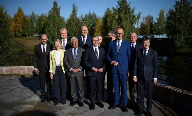 Minister for Europe and Foreign Affairs of France Jean-Noel Barrot, from left, High Representative of the Union for Foreign Affairs, Security Policy Kaja Kallas, President of Lithuania Gitanas Nauseda, President of the European Council António Costa, Prime Minister of Latvia Andris Kulbergs, Finnish Prime Minister Petteri Orpo, Prime Minister of Denmark Mette Frederiksen, Prime Minister of Estonia Kristen Michal, Federal Chancellor of Germany Friedrich Merz, Commissioner for International Partnerships Jozef Síkela and President of Romania Nicușor Dan pose for a family photo during the European Arctic Summit in Rovaniemi, Finland, Monday, Sept. 14, 2026. (Jouni Porsanger/Lehtikuva via AP)
