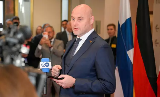 Prime Minister of Latvia Andris Kulbergs speaks to the media during the European Arctic Summit in Rovaniemi, Finland, Monday, Sept. 14, 2026. (Jouni Porsanger/Lehtikuva via AP)