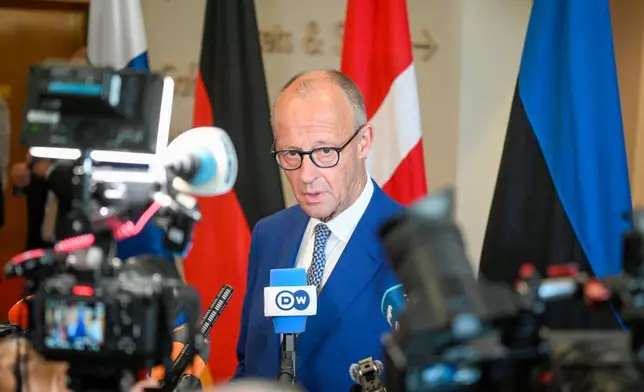 Federal Chancellor of Germany Friedrich Merz speaks to media during the European Arctic Summit in Rovaniemi, Finland, Monday, Sept. 14, 2026. (Jouni Porsanger/Lehtikuva via AP)