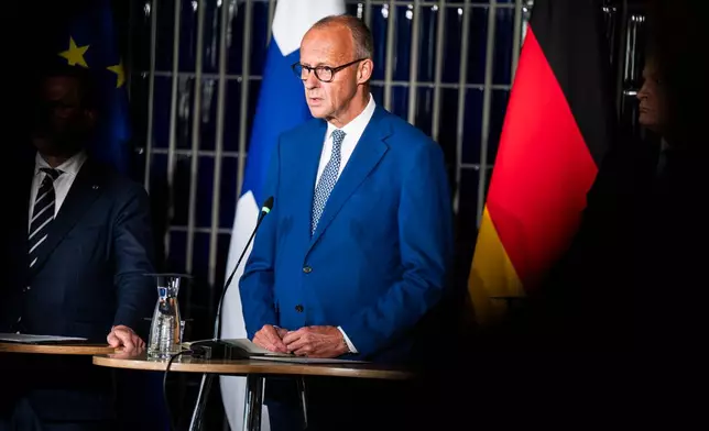 German Chancellor Friedrich Merz speaks during a press conference as part of the European Arctic Summit in Rovaniemi, Finland, Monday, Sept. 14, 2026. (Jouni Porsanger/Lehtikuva via AP)