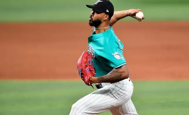 Miami Marlins pitcher Sandy Alcantara throws during the ninth inning of a baseball game against the Atlanta Braves, Sunday, Sept. 27, 2026, in Miami. (AP Photo/Michael Laughlin)