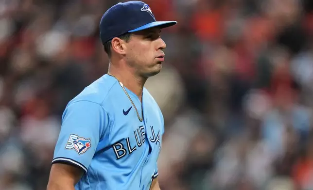 Toronto Blue Jays starting pitcher CJ Van Eyk reacts after retiring the side during the first inning in the second baseball game of a doubleheader against the Baltimore Orioles, Wednesday, Sept. 23, 2026, in Baltimore. (AP Photo/Stephanie Scarbrough)