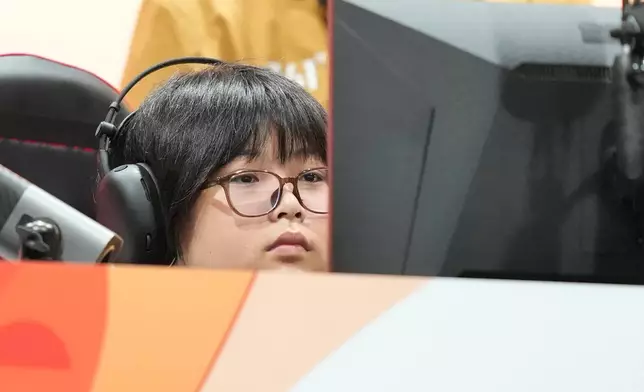 Japan's Yuki Kurihara prepares for his Puyo Puyo Champions esports quarterfinal match against Singapore's Justine Koh Mun June at the Asian Games in Nagoya, Japan, Saturday, Sept. 26, 2026. (AP Photo/Dita Alangkara) CORRECTION: Corrects first name to Yuki instead of Yuri