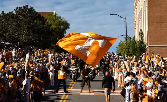 Tennessee mascot waves the Power T flag during the Vol Walk before an NCAA college football game between Tennessee and Texas, Saturday, Sept. 26, 2026, in Knoxville, Tenn. (AP Photo/Wade Payne)