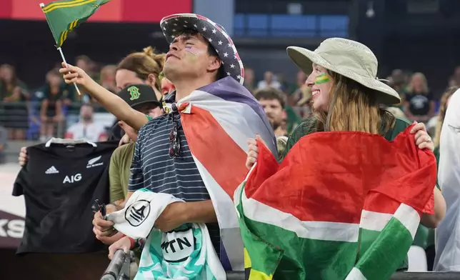 Fans react following the rugby international between South Africa and New Zealand in Baltimore, USA, Saturday, Sept. 12, 2026. (AP Photo/Stephanie Scarbrough)