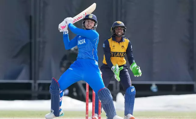 India's Smriti Shriniwas Mandhana bats during the women's gold medal T20 cricket game between India and Sri Lanka at the Asian Games in Nisshin, Japan, Tuesday, Sept. 22, 2026. (AP Photo/Mark Baker)