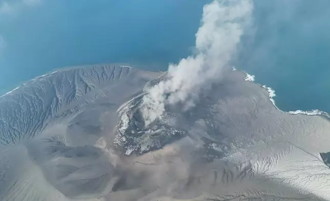 In this drone photo released by the Geological Agency (Badan Geologi) of Indonesia's Ministry of Energy and Mineral Resources, Mount Anak Krakatau spews volcanic smoke in Sunda Strait, Indonesia, Saturday, Sept. 5, 2026. (Badan Geologi via AP)