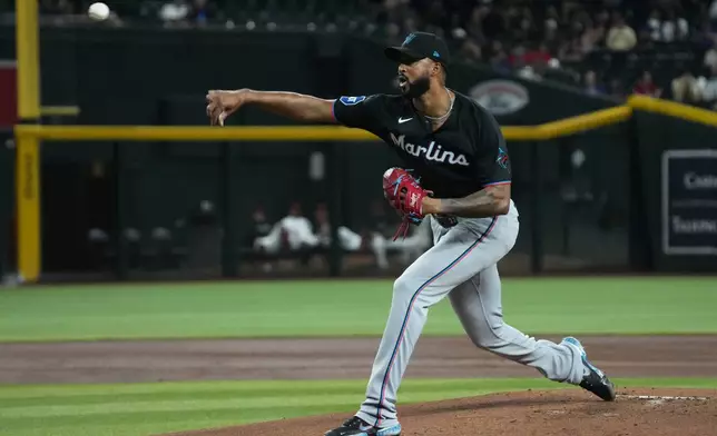 Miami Marlins pitcher Sandy Alcantara throws against the Arizona Diamondbacks in the first inning of a baseball game, Monday, Sept 14, 2026, in Phoenix. (AP Photo/Rick Scuteri)