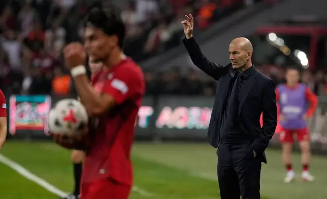 France's coach Zinedine Zidane gives instructions during the UEFA Nations League soccer match between Turkey and France in Izmit, Turkey, Friday, Sept. 25, 2026. (AP Photo/Khalil Hamra)