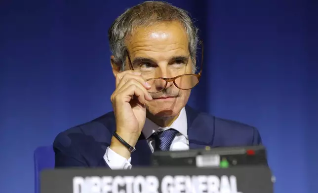 IAEA Director General Rafael Grossi watches from the podium during the annual General Conference of the International Atomic Energy Agency (IAEA) in Vienna, Austria, Monday, Sept. 14, 2026. (AP Photo/Heinz-Peter Bader)