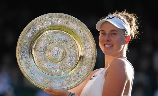 FILE - Linda Noskova of the Czech Republic poses with the trophy after winning against Karolina Muchova of the Czech Republic in the women's singles final at Wimbledon Tennis Championships in London, July 11, 2026. (AP Photo/Kirsty Wigglesworth, File)
