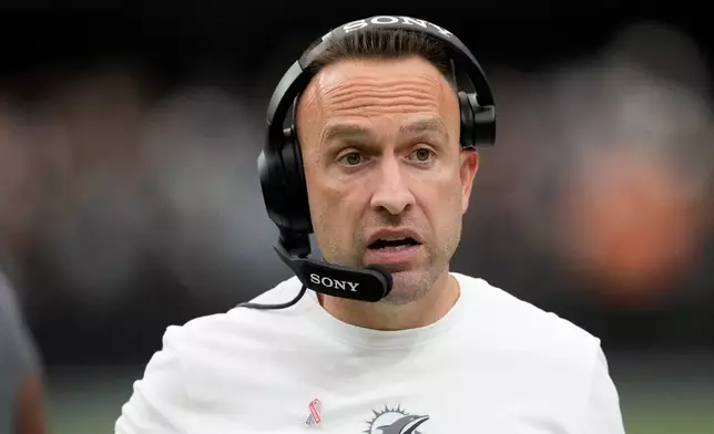 Miami Dolphins head coach Jeff Hafley watches from the sideline during the first half of an NFL football game against the Las Vegas Raiders, Sunday, Sept. 13, 2026, in Las Vegas. (AP Photo/Ross D. Franklin)