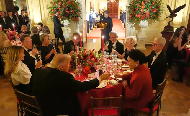 President Donald Trump toasts with Peng Liyuan during a State Dinner with China's President Xi Jinping in the East Room of the White House, Thursday, Sept. 24, 2026, in Washington. (AP Photo/Alex Brandon)
