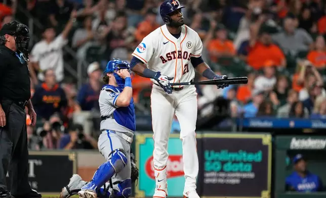Houston Astros designated hitter Yordan Alvarez watches his home run during the fifth inning of a baseball game against the Kansas City Royals in Houston, Tuesday, Sept. 15, 2026. (AP Photo/Ashley Landis)