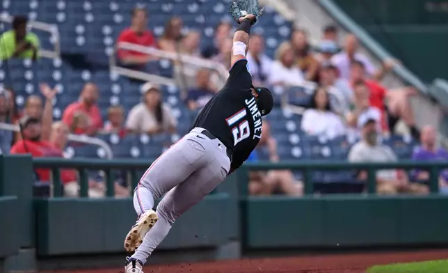 Miami Marlins third baseman Leo Jiménez catches a foul ball hit by Washington Nationals' Abimelec Ortiz during the first inning of a baseball game, Monday, Aug. 31, 2026, in Washington. (AP Photo/John McDonnell)