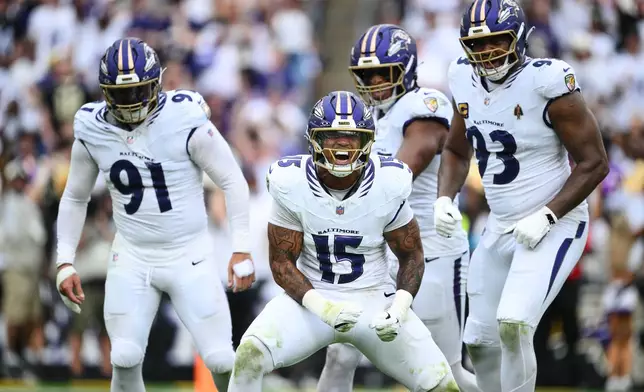 Baltimore Ravens linebacker Mike Green (15) celebrates his sack in the second half of an NFL football game against the New Orleans Saints in Baltimore, Sunday, Sept. 20, 2026. (AP Photo/Nick Wass)