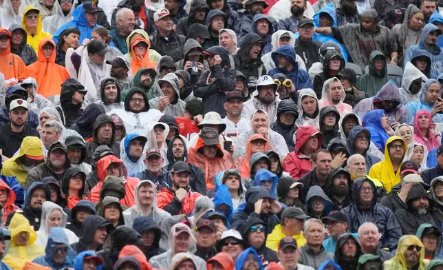 Fans watch during the first half of an NFL football game between the Chicago Bears and the Minnesota Vikings in Chicago, Sunday, Sept. 20, 2026. (AP Photo/Nam Y. Huh)