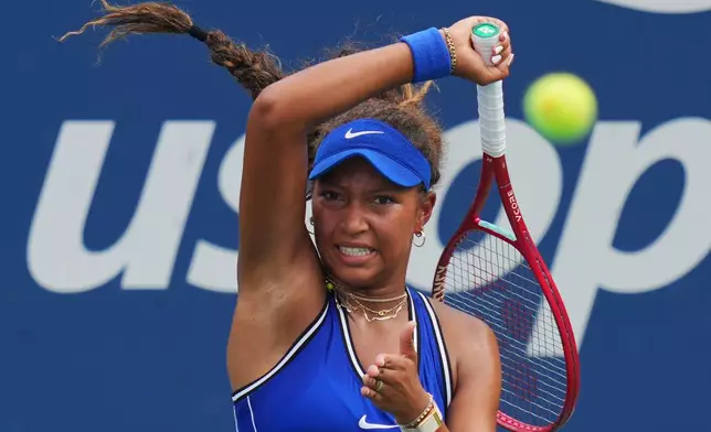 Thea Frodin, of the United States, returns the ball to Elena Rybakina, of Kazakhstan, during the first round of the U.S. Open tennis championships Tuesday, Sept. 1, 2026, in New York. (AP Photo/Kirsty Wigglesworth)