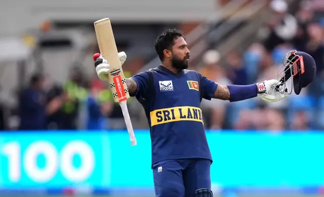 Sri Lanka's Kusal Mendis celebrates a century during the second one day international cricket match between England and Sri Lanka in Leeds, England, Thursday Sept. 24, 2026. (Mike Egerton/PA via AP)