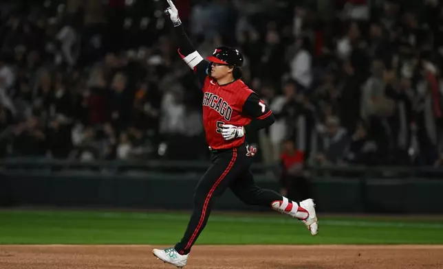 Chicago White Sox's Munetaka Murakami, of Japan, celebrates while rounding the bases after hitting a solo home run during the first inning of a baseball game against the Colorado Rockies Friday, Sept. 25, 2026, in Chicago. (AP Photo/Paul Beaty)