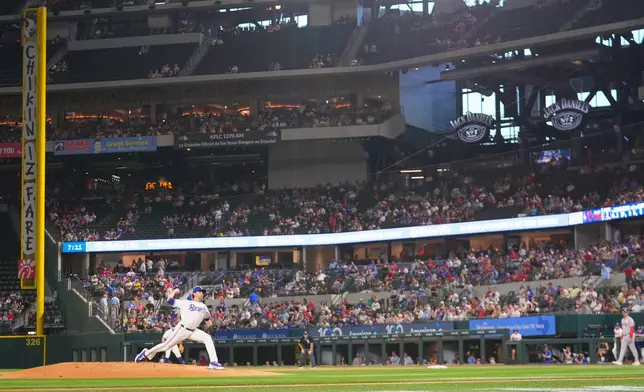Texas Rangers starting pitcher Jacob deGrom throws to the Boston Red Sox during the first inning of a baseball game Tuesday, Sept. 15, 2026, in Arlington, Texas. (AP Photo/Julio Cortez)