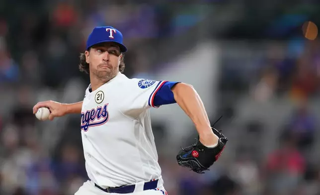 Texas Rangers starting pitcher Jacob deGrom throws to the Boston Red Sox during the first inning of a baseball game Tuesday, Sept. 15, 2026, in Arlington, Texas. (AP Photo/Julio Cortez)